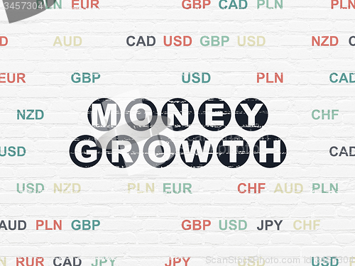 Image of Currency concept: Money Growth on wall background