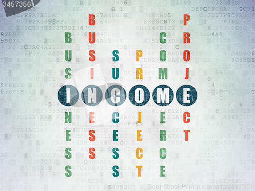 Image of Business concept: word Income in solving Crossword Puzzle
