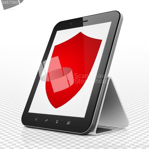 Image of Protection concept: Tablet Computer with Shield on display