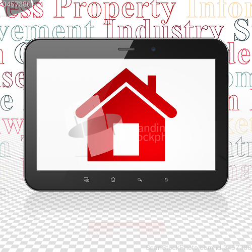 Image of Finance concept: Tablet Computer with Home on display