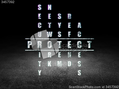 Image of Security concept: word Protect in solving Crossword Puzzle