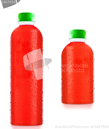 Image of bottles fruit juice with drops of water isolated