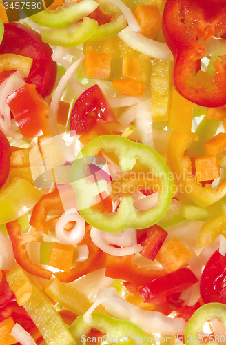 Image of Red, yellow and green bell pepper slices