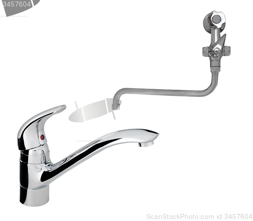 Image of old with modern stainless steel tap