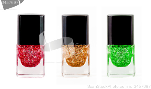 Image of Red, yellow, green nail polisher