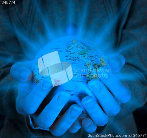 Image of Globe in a girl's hands