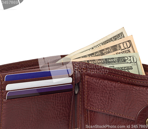 Image of close up of brown leather wallet with money