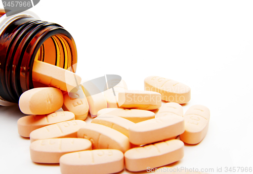 Image of Pills from bottle close-up