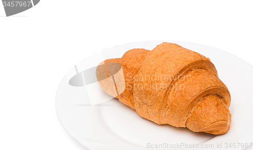 Image of Fresh and tasty croissant over white background