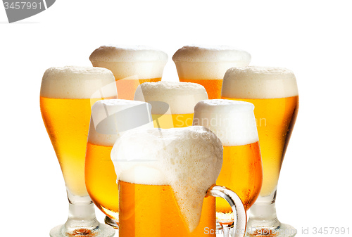 Image of Glasses of beer isolated over white