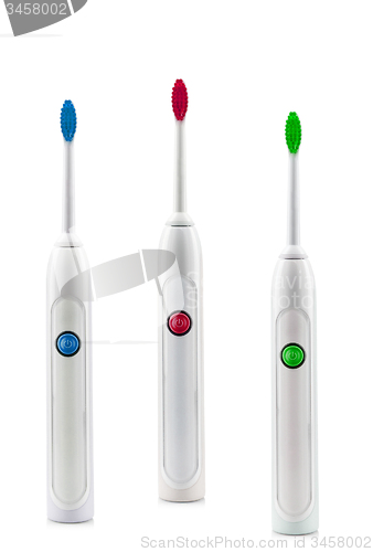 Image of electric toothbrushes on white background