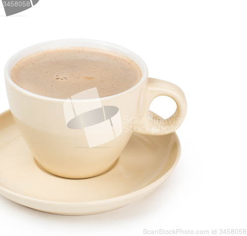 Image of small white cup of cappuccino coffee