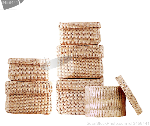 Image of isolated round woven straw basket