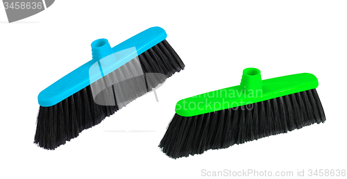 Image of Brushes the floor on a white