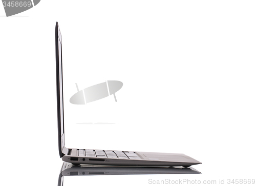 Image of Modern laptop side view