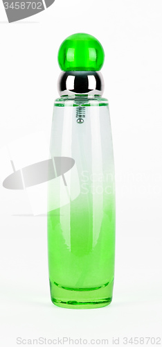 Image of green parfume bottle isolated