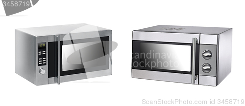 Image of microwave ovens on background