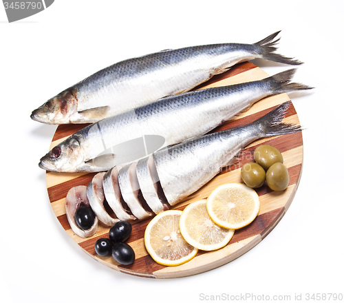 Image of Fish with lemon and olive