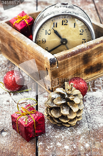 Image of retro arrangement for Christmas with an old alarm clock