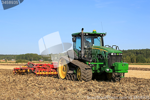 Image of John Deere 8345RT Tracked Tractor and Vaderstad Cultivator 