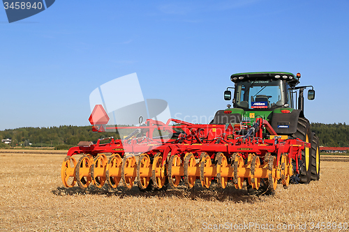 Image of Vaderstad Opus 400 Cultivator and John Deere Tractor on Field