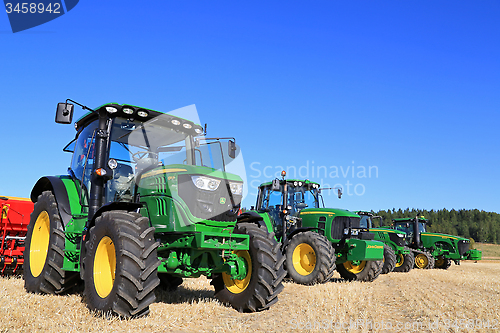 Image of Line up of John Deere Agricultural Tractors