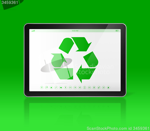 Image of Digital tablet PC with a recycling symbol on screen. ecological 