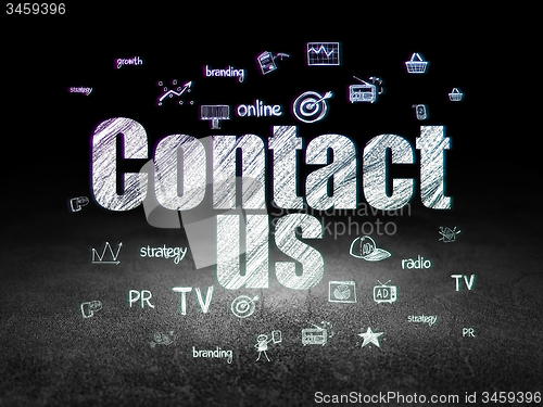 Image of Marketing concept: Contact Us in grunge dark room