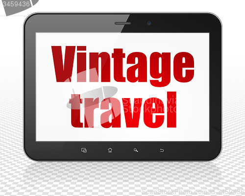 Image of Travel concept: Tablet Pc Computer with Vintage Travel on display