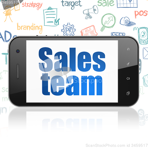 Image of Marketing concept: Smartphone with Sales Team on display