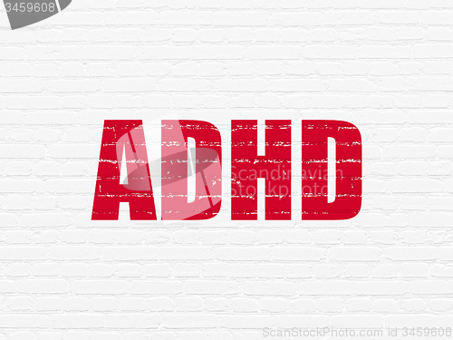 Image of Health concept: ADHD on wall background