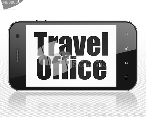 Image of Tourism concept: Smartphone with Travel Office on display