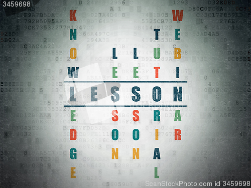 Image of Studying concept: word Lesson in solving Crossword Puzzle