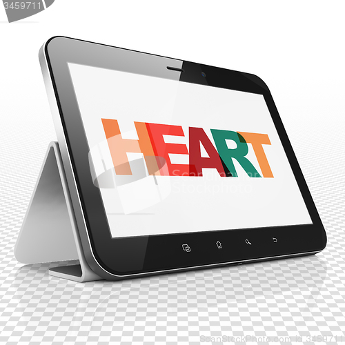 Image of Health concept: Tablet Computer with Heart on  display