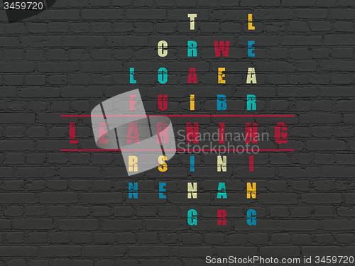 Image of Education concept: word Learning in solving Crossword Puzzle