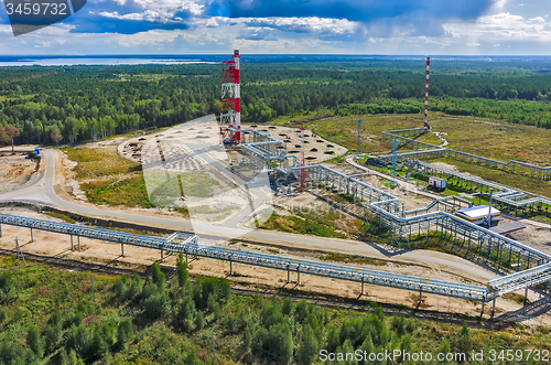 Image of Torches for burning of associated gas of oil plant