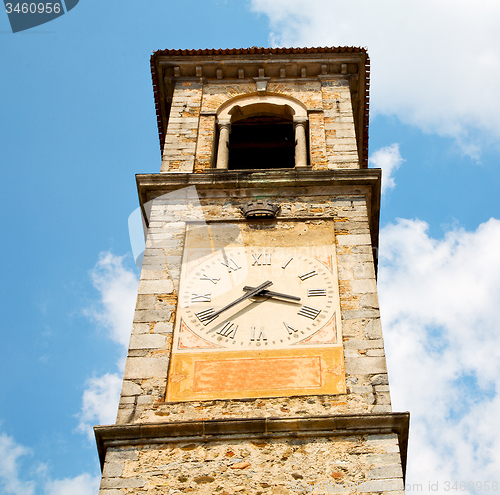 Image of ancien clock tower in italy europe old  stone and bell