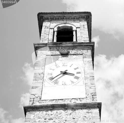 Image of ancien clock tower in italy europe old  stone and bell