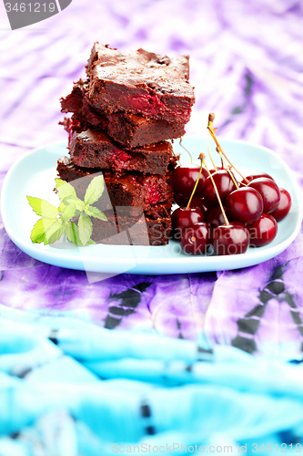 Image of brownie with cherries