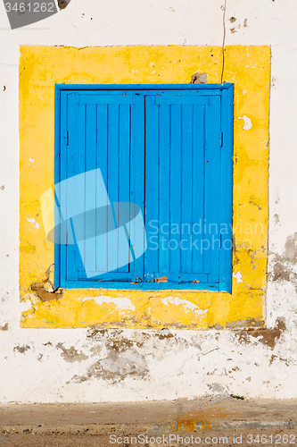 Image of blue window in morocco africa old construction 