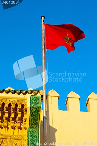 Image of tunisia  waving flag in the blue sky    battlements  