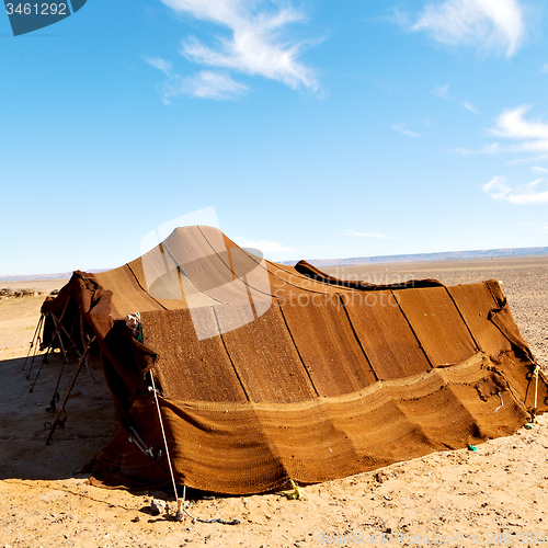 Image of tent in  the desert of morocco sahara and rock  stone    sky