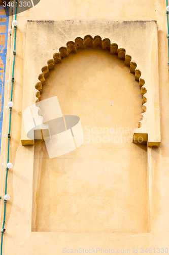 Image of   yellow window in morocco  old construction and brown  