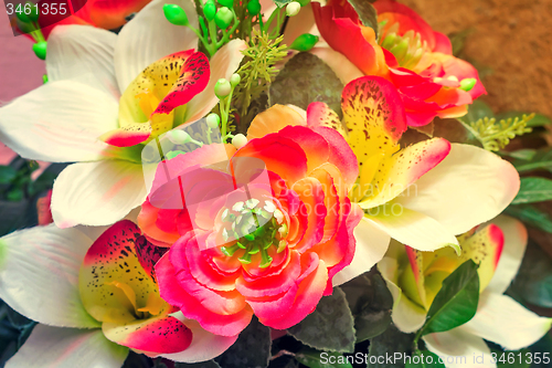 Image of Small beautiful bouquet of artificial flowers