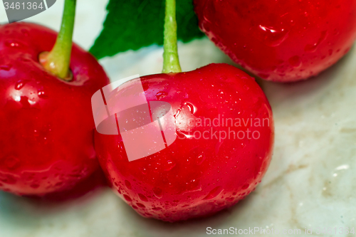 Image of Bright red delicious ripe cherries