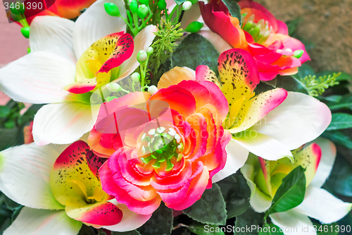 Image of Small beautiful bouquet of artificial flowers