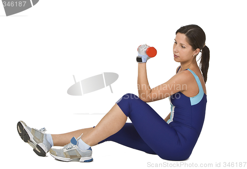 Image of Woman doing a barbell exercise