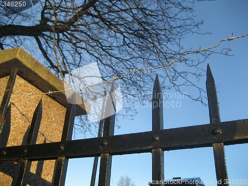 Image of Fence with barbed wire