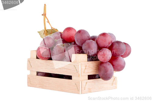 Image of Red grapes in wooden crate