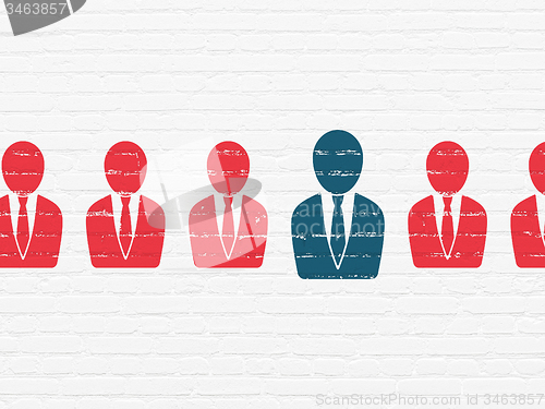 Image of Finance concept: business man icon on wall background